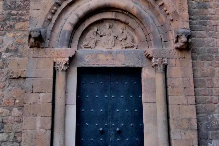 The round-arched portal of Sant Pau del Camp, its sculpted tympanum and ornate capitals